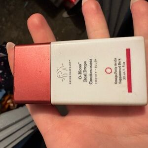 Drunk Elephant Rosi Drops in White and Red